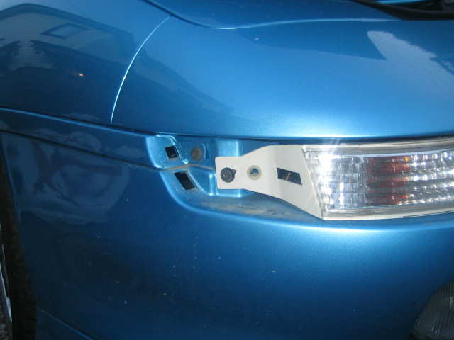 Starter med å fjerne refleksen for så å skru ut parklyset