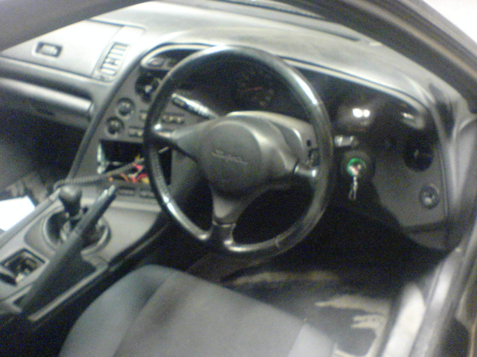 sitter en dobbel din dvd spiller i den åpne plassen nå da...