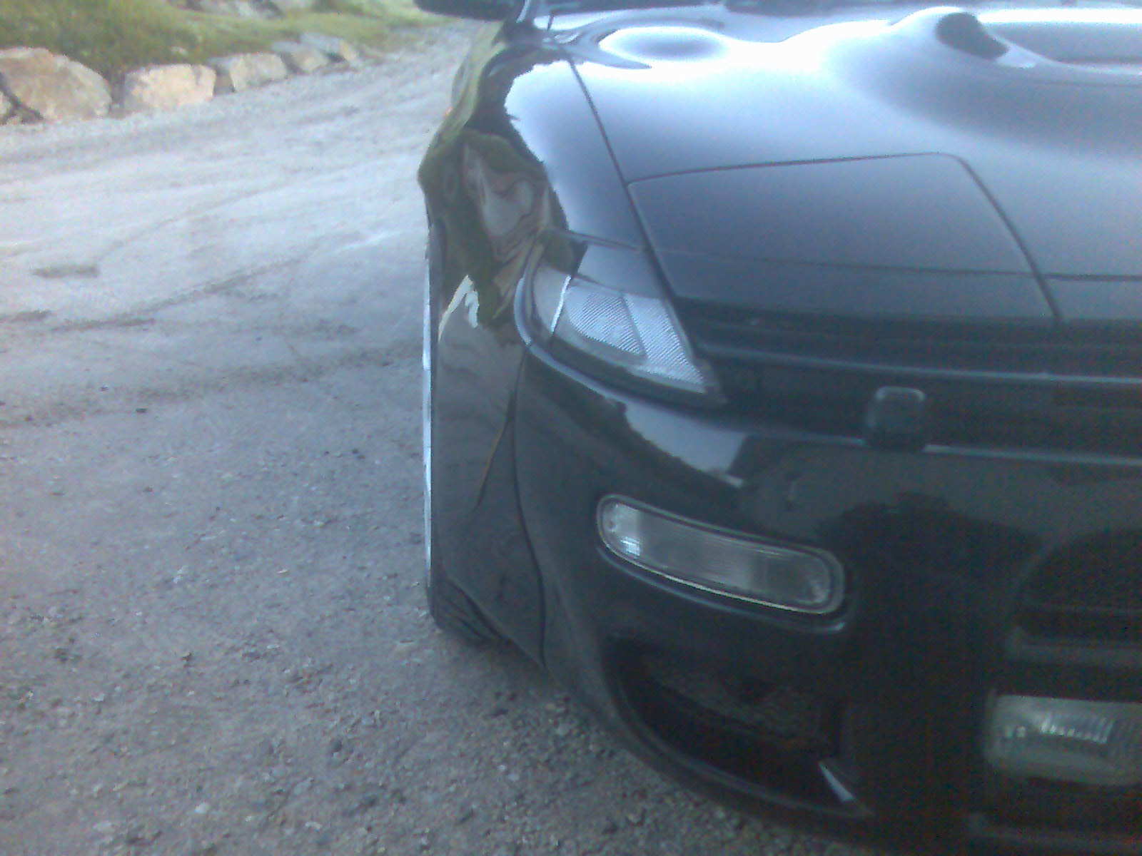 Framskjerm og knust parklys