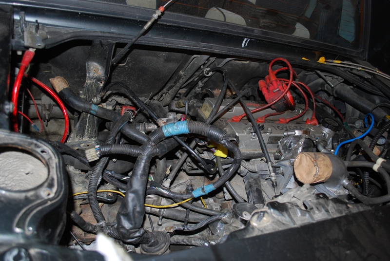 Motoren på plass i bilen.. henger på 3 fester