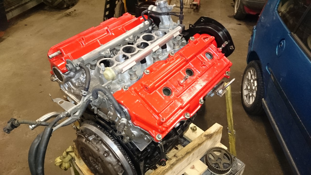 innsugsmanifold, med nye pakninger til dyser og kjøletilførsel